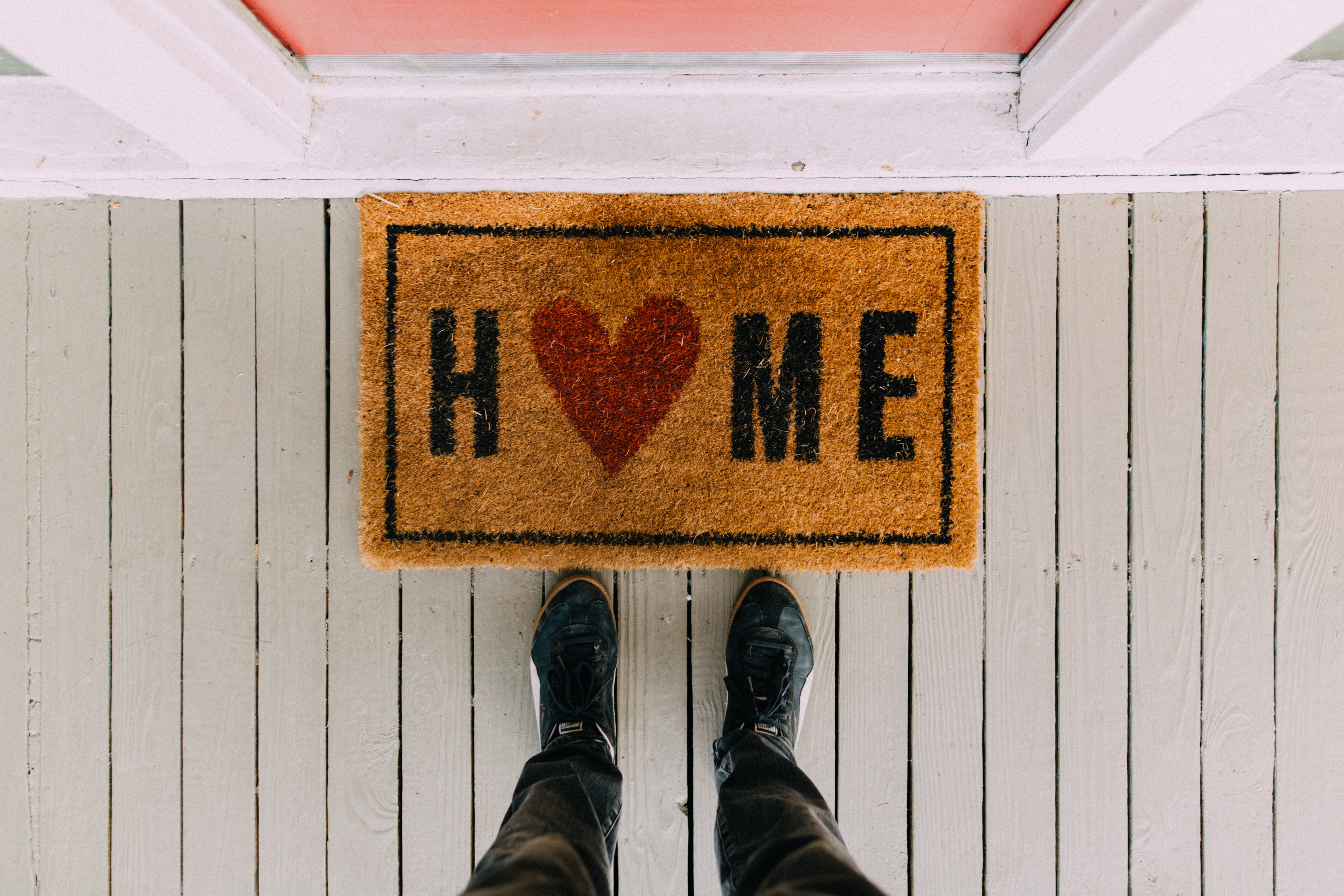 A welcome mat that reads 